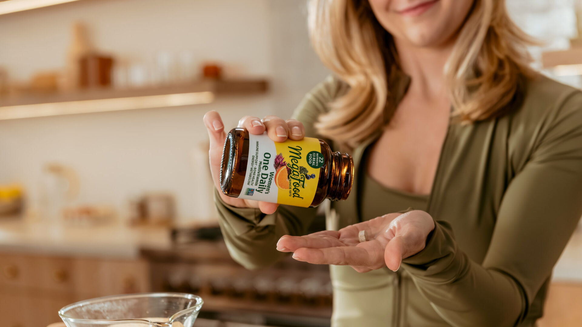 MegaFood's new photography captures real-life moments and embraces reality paired with dynamic lighting, reflections, and warmth inspired by the brand’s amber glass bottles.